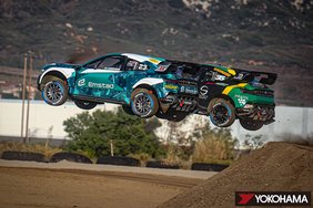 Car in flight at a 2023 Nitrocross race