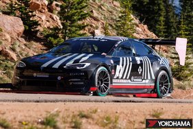 Car competing in the 2023 Pikes Peak International Hill Climb on ADVAN A005 tyres using biomass materials