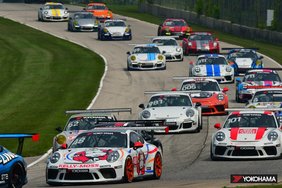 Porsche 911 GT3 Cup cars racing in the Porsche Sprint Challenge North America by YOKOHAMA